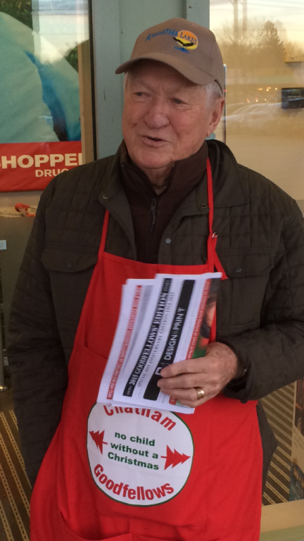 Dr. John Roe an 8 year veteran of Chatham Goodfellows sells Chatham Goodfellow papers at Shoppers Drug Mart on St. Clair Street.